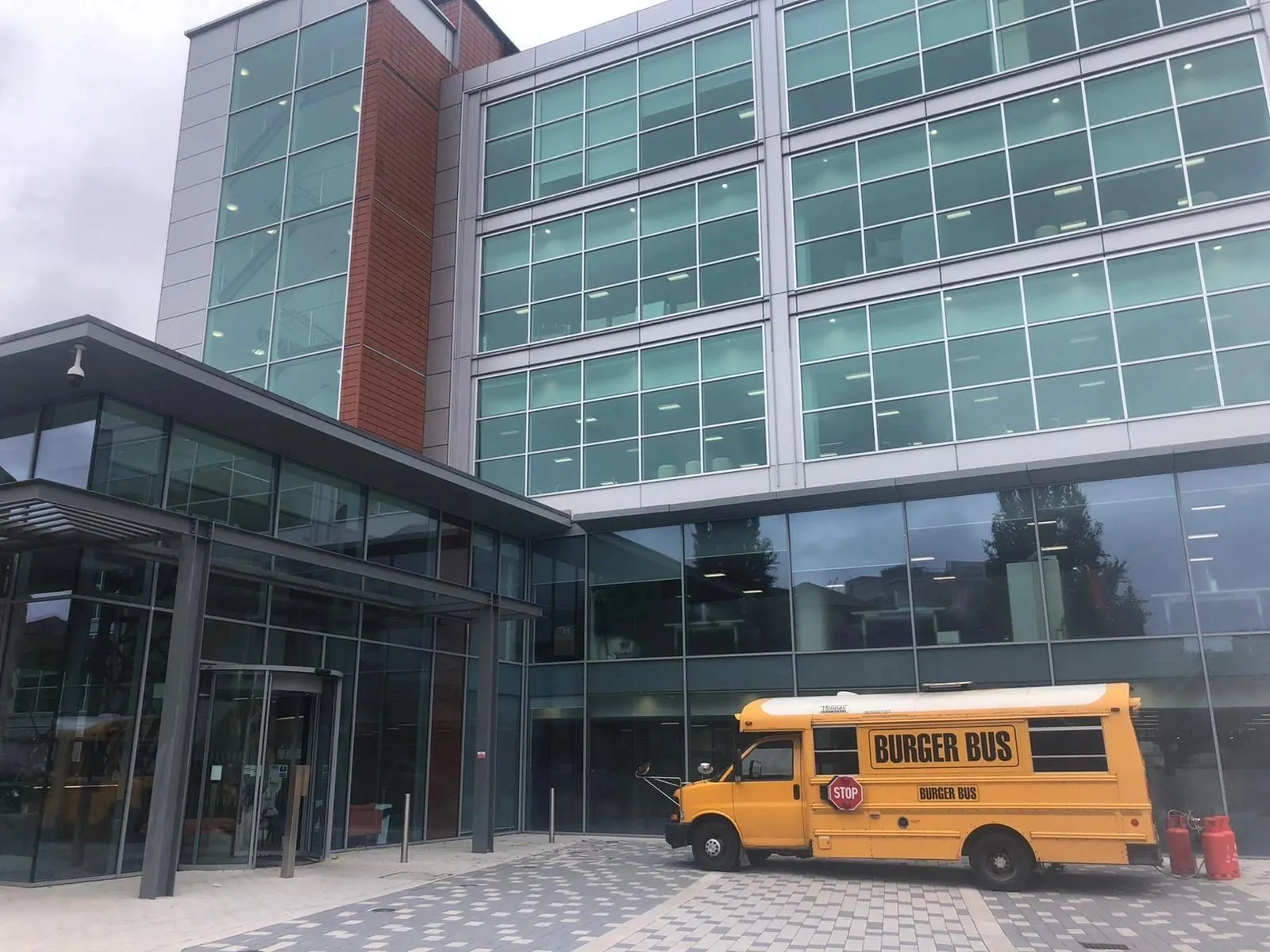 Burger Bus outside an office building for workplace catering