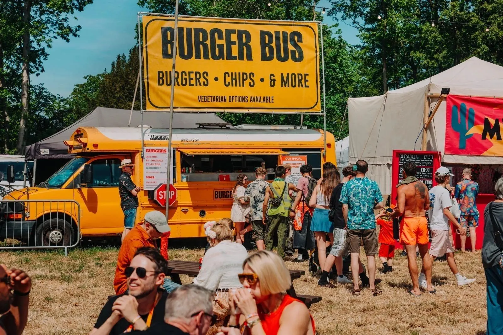 Festival crowd around Burger Bus at Shindig Festival
