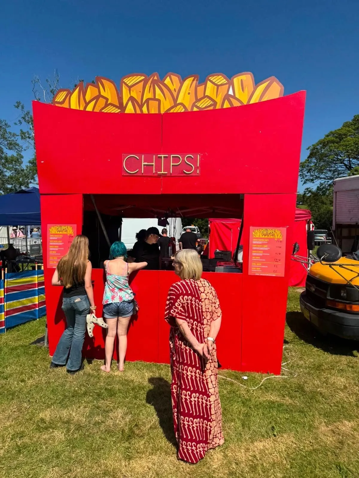 Customers at the CHIPS! stall at a festival